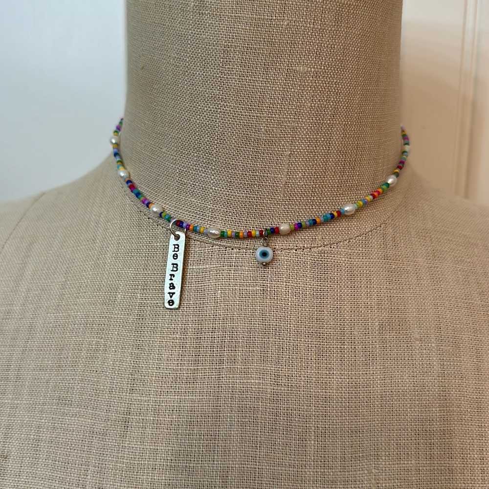 Be brave statement chocker with evil eye bead and colored beads.   Fun.
